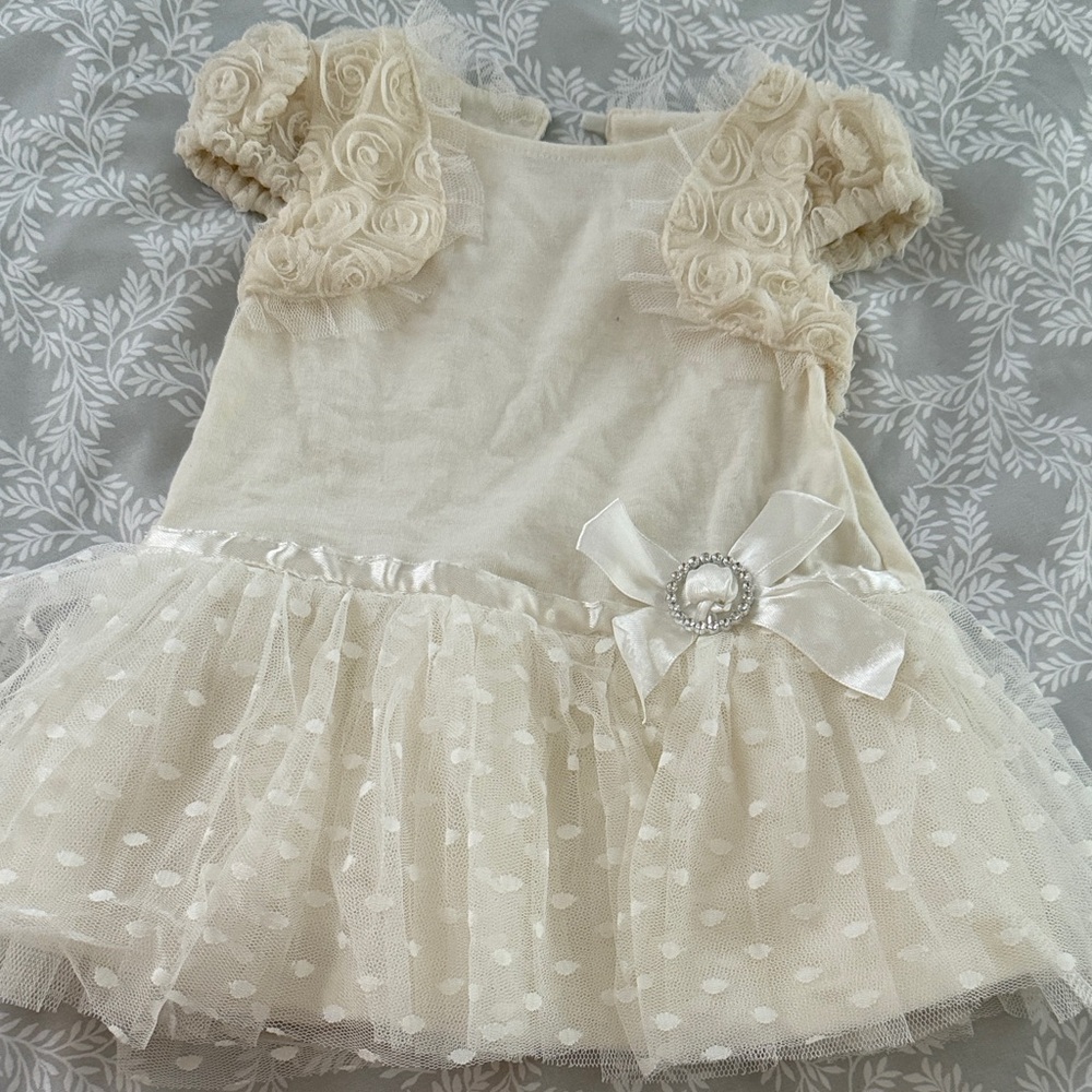 Nanette Baby Cream Dress with Rosette Sleeves